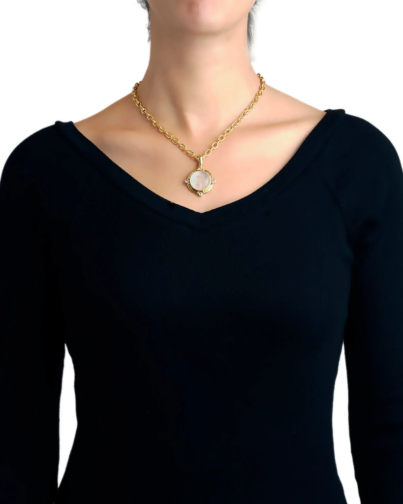 Rock crystal Queen Bee intaglio pendant with moonstone gemstones shown worn on a necklace